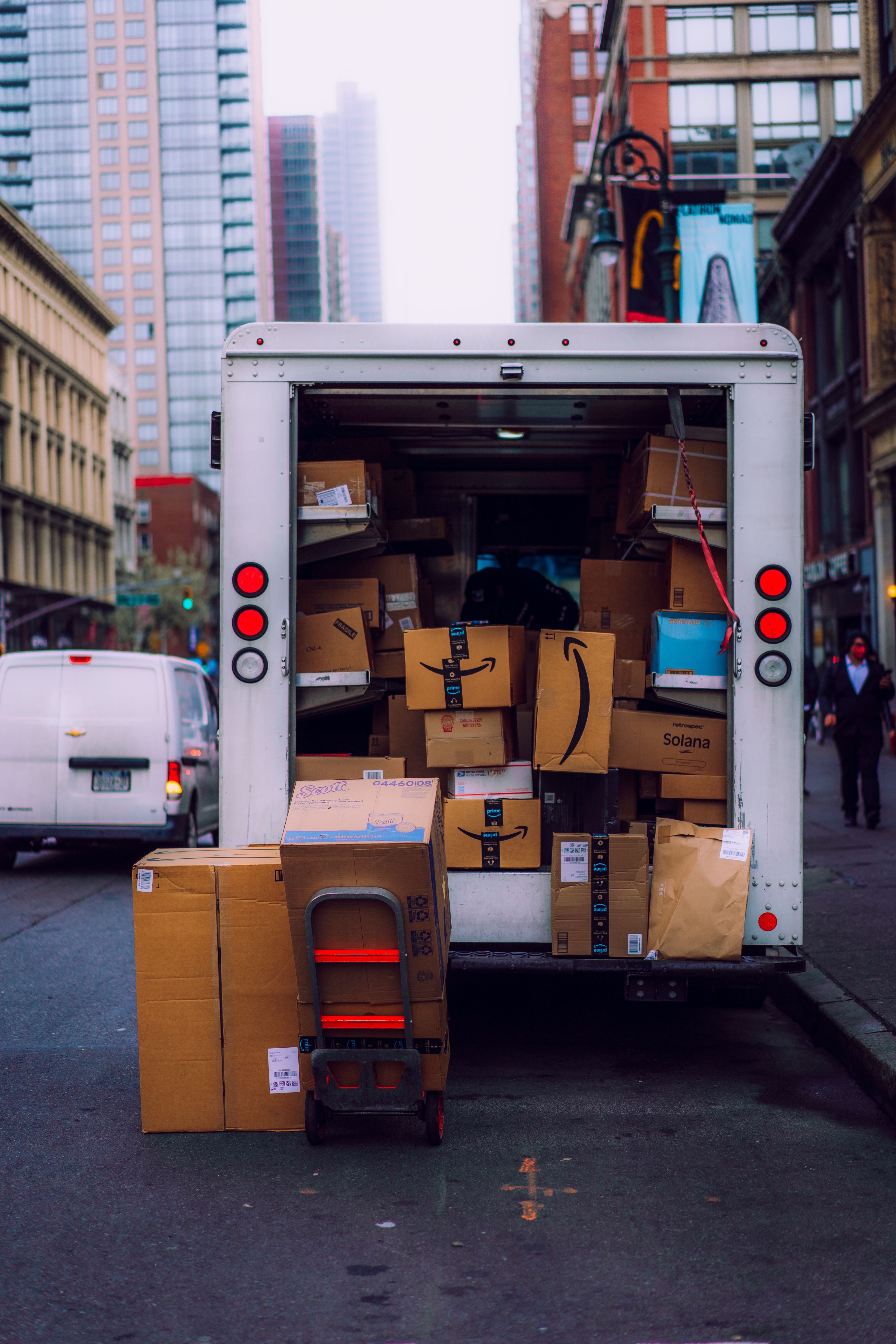Road delivery truck loading parcels for local and regional routes